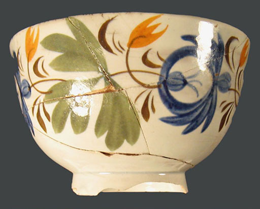 Hand-painted pearlware handleless tea cup (blue, gold, green, brown) 